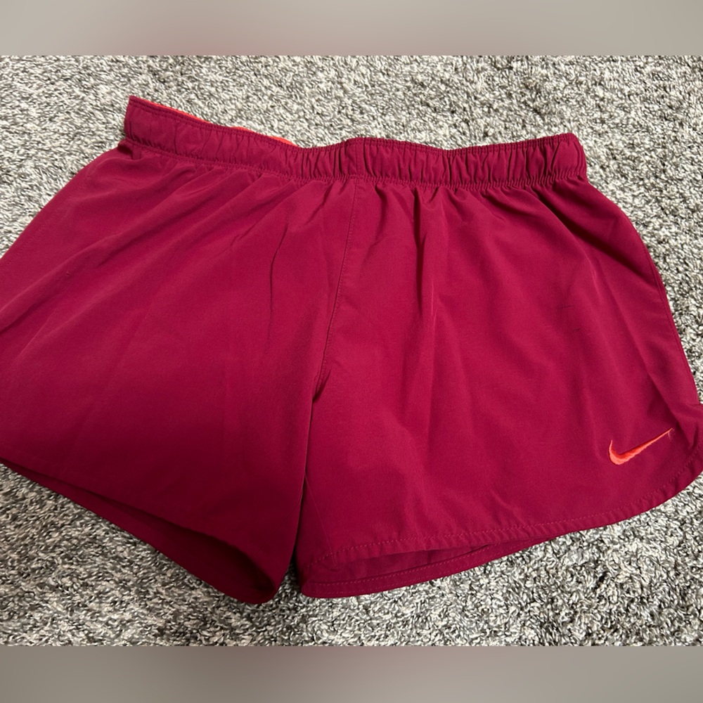 Medium Nike dry-fit shorts with spandex.
